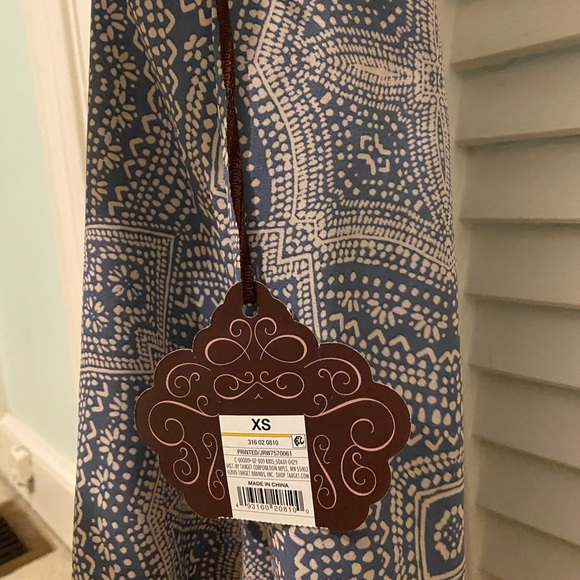 Patterned V-Neck Top with Tassels - Picture 3 of 3